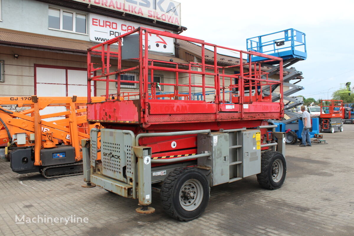 ножничный подъемник Skyjack SJ 8831 - 12 m scissor lift 4x4 diesel genie 3384 haulotte